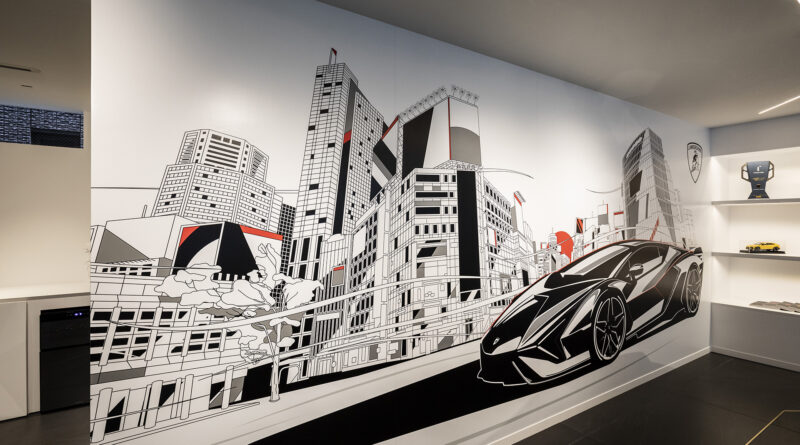 Lamborghini THE LOUNGE TOKYO Ad Personam area. Mural of a Lamborghini against a Tokyo city scape