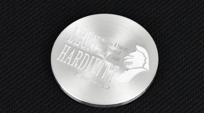 Leon Hardiritt center cap with Knight logo in white finish