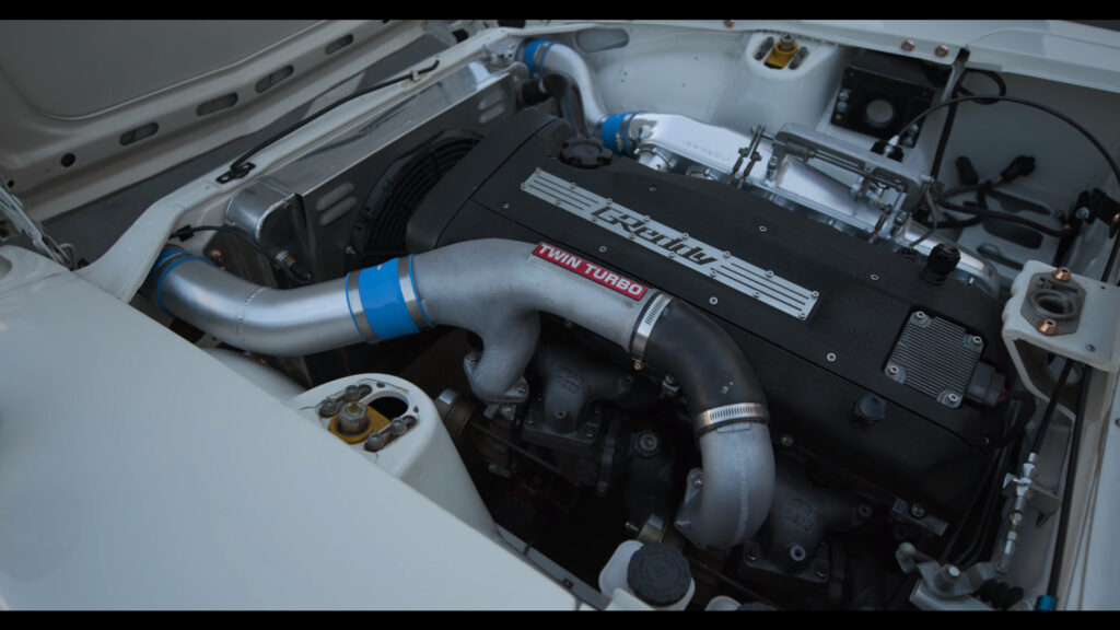 Nissan RB26DETT engine from a Skyline GT-R swapped into a Datsun 240Z built by GReddy Performance