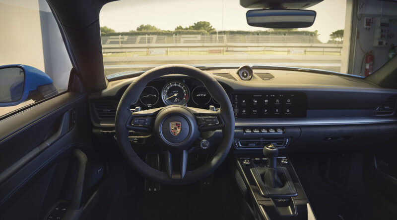 2022 Porsche 911 GT3 interior view featuring the multi-function steering wheel