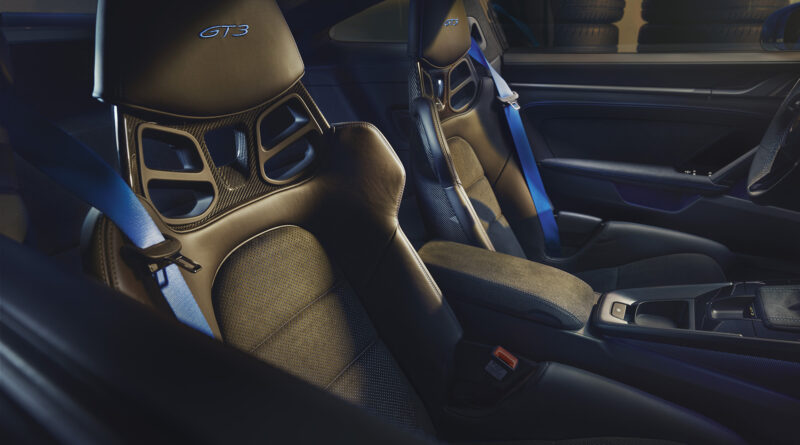 2022 Porsche 911 GT3 interior view featuring the optional carbon fiber bucket seats