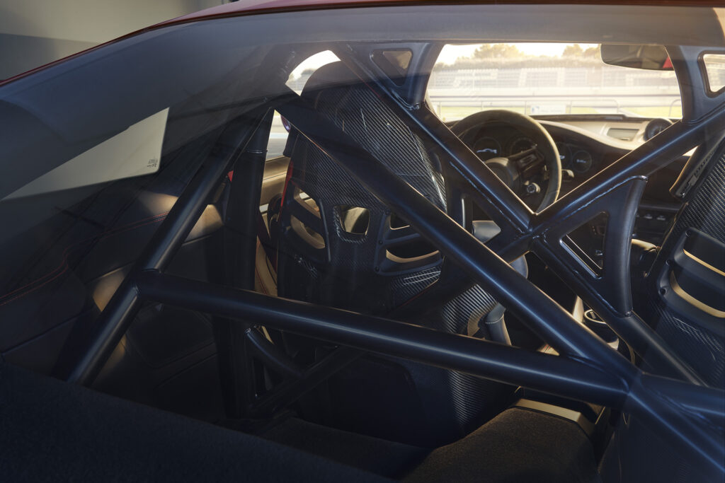 2022 Porsche 911 GT3 interior view featuring the optional rear roll cage
