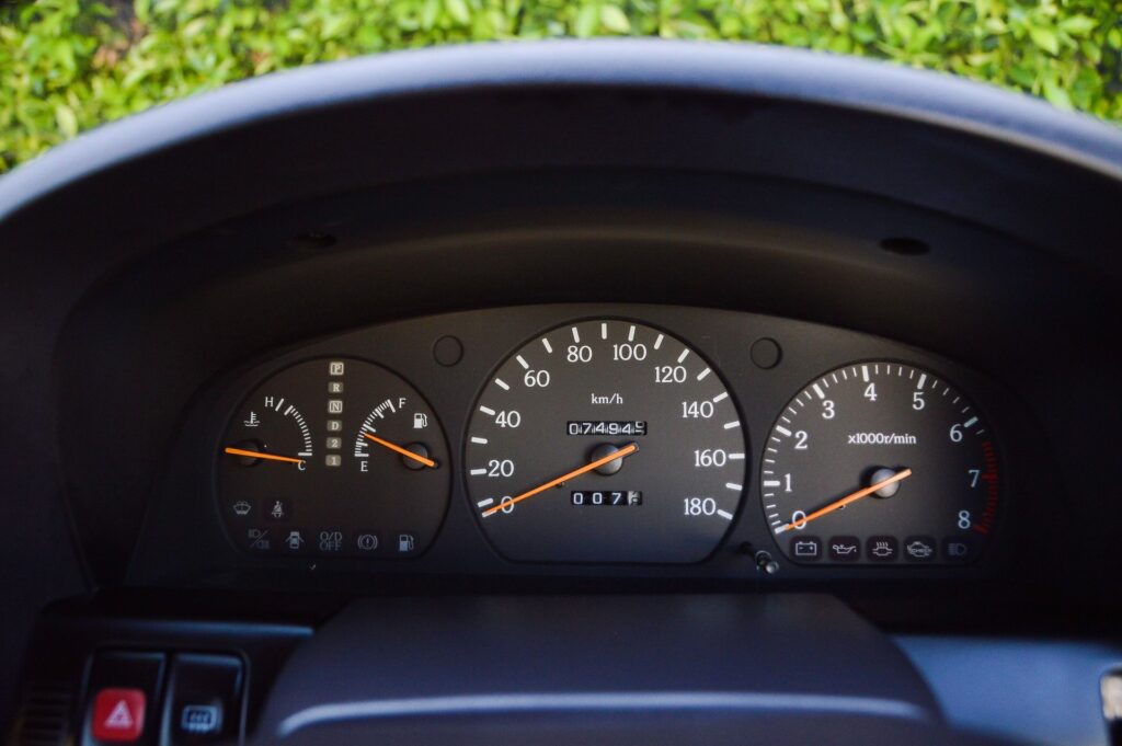Black 1995 Nissan Gloria sedan gauge cluster