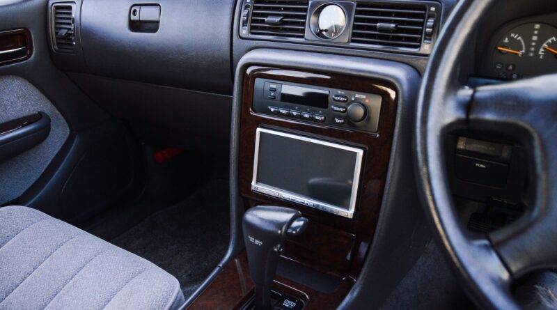 Black 1995 Nissan Gloria sedan interior car audio