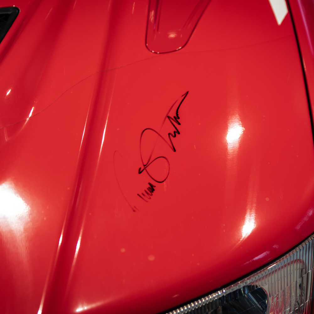Mitsubishi Lancer Evolution VI Tommi Makinen Edition with Makinen's autograph on the hood