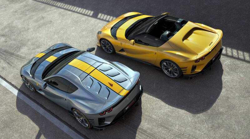 Ferrari 812 Competizione (metallic blue with yellow racing stripe) and Ferrari 812 Competizione A (yellow) parked next to each other with an overhead view