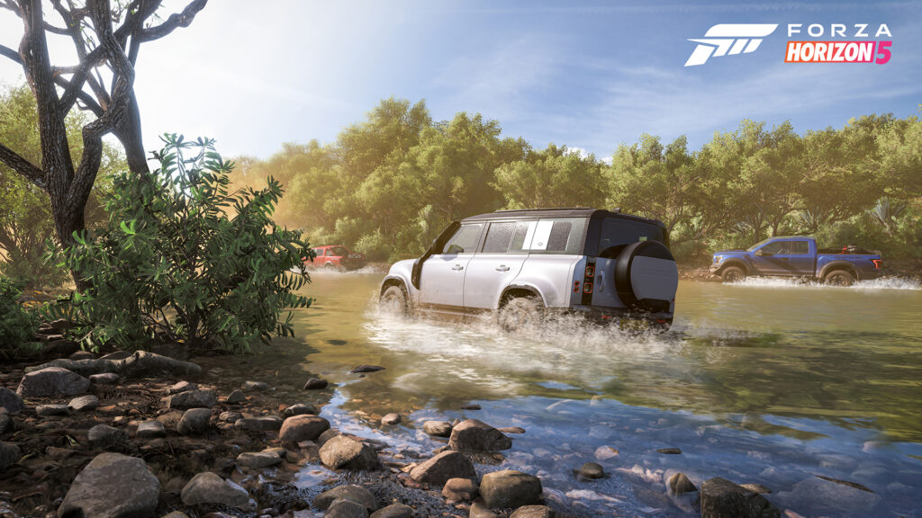 Forza Horizon 5 screenshot of a white 2021 Land Rover Defender treading through water