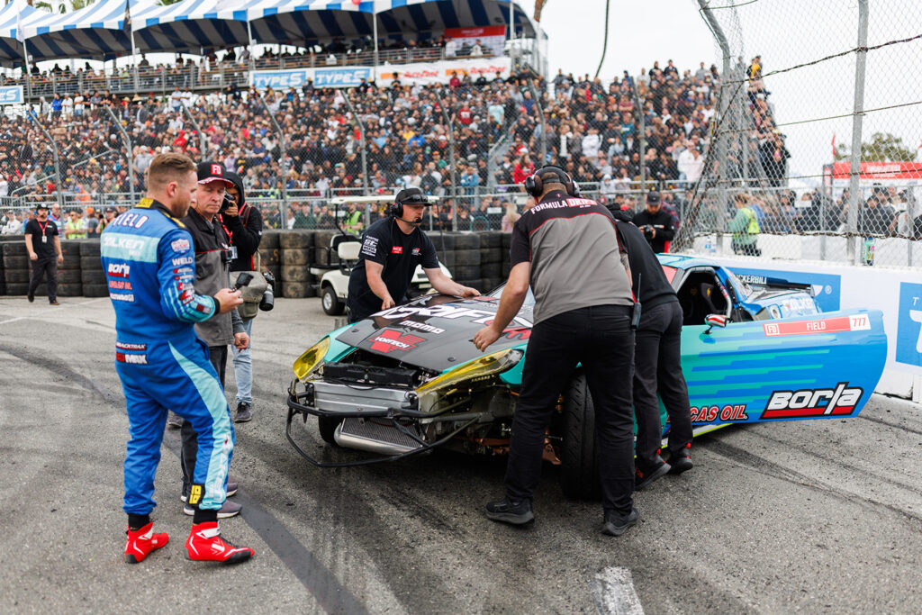 The aftermath of Matt Field's damaged Corvette after he collided with Fredric Aasbo at Formula Drift Long Beach 2022