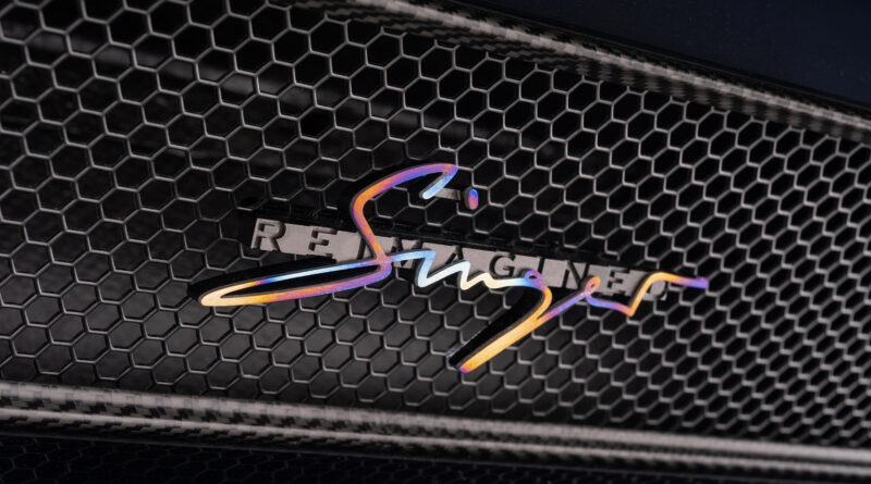 Decklid badge view. The Singer badging has been specified in heat treated titanium, matching the material used for the side exit exhaust finishers.
